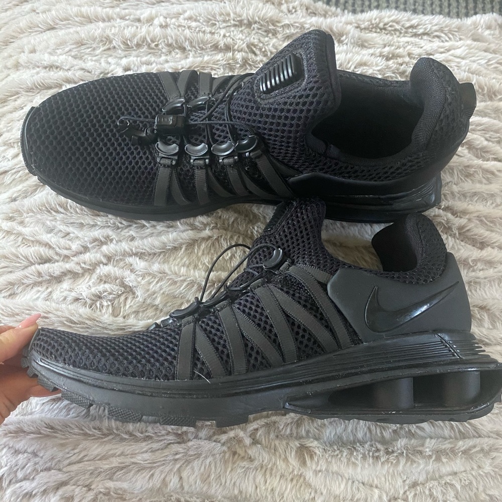 Never worn, black Nike shox gravity shoes
